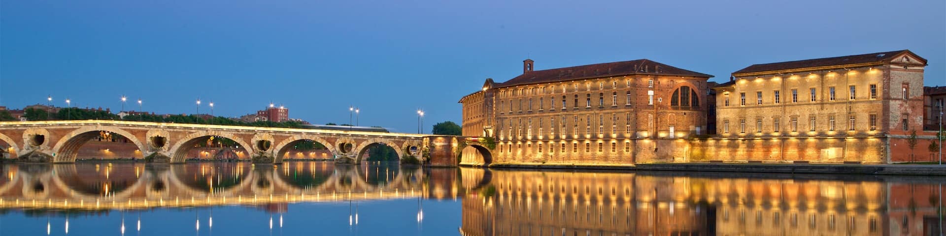 Pont Neuf featuring night scenes, heritage architecture and a lake or waterhole