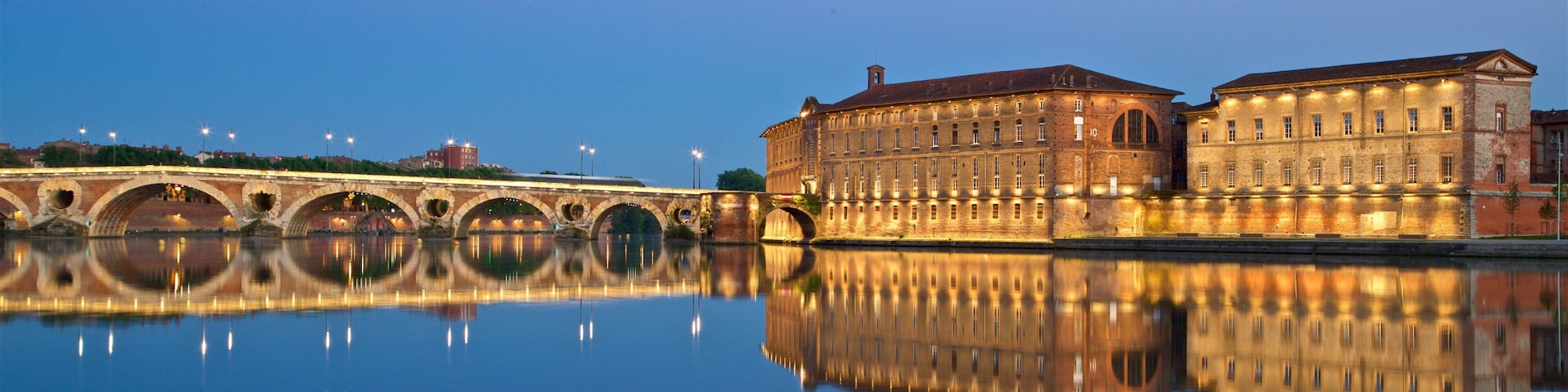 Pont Neuf featuring night scenes, heritage architecture and a lake or waterhole