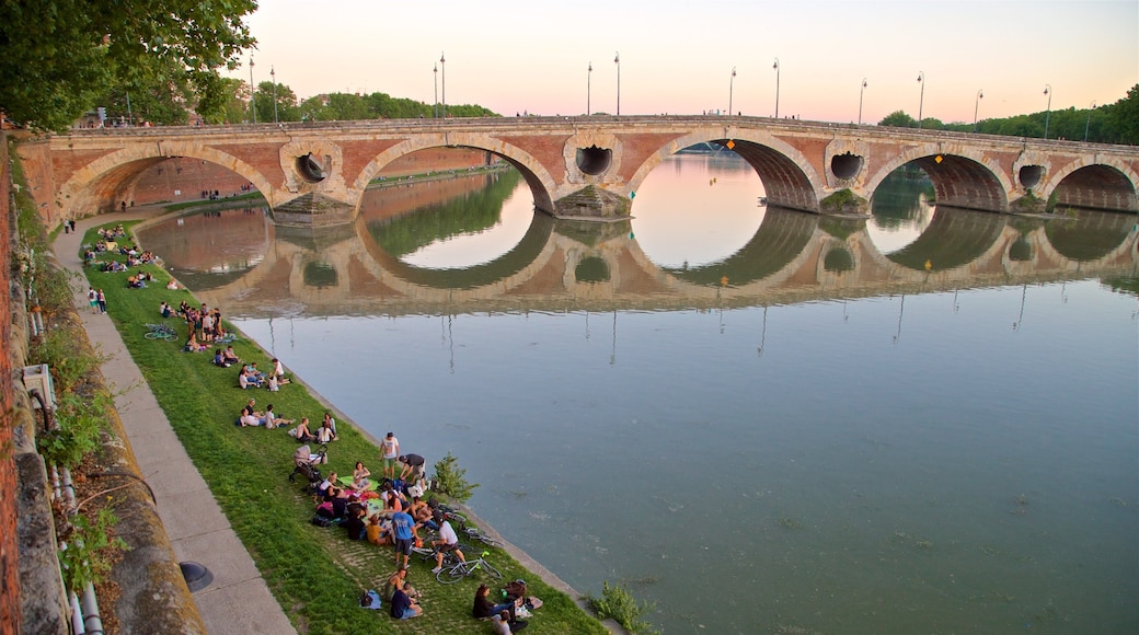 Pont Neuf showing a sunset, a river or creek and a bridge