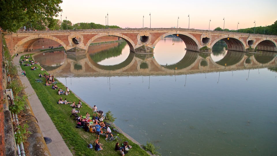 Pont Neuf showing a river or creek, a sunset and a bridge