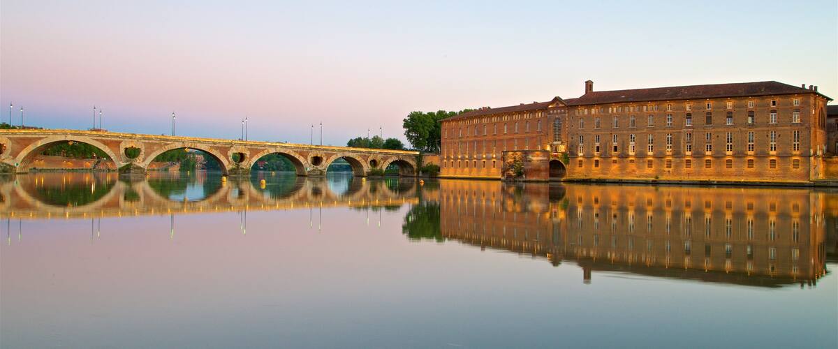 Pont Neuf which includes a river or creek, a sunset and a bridge