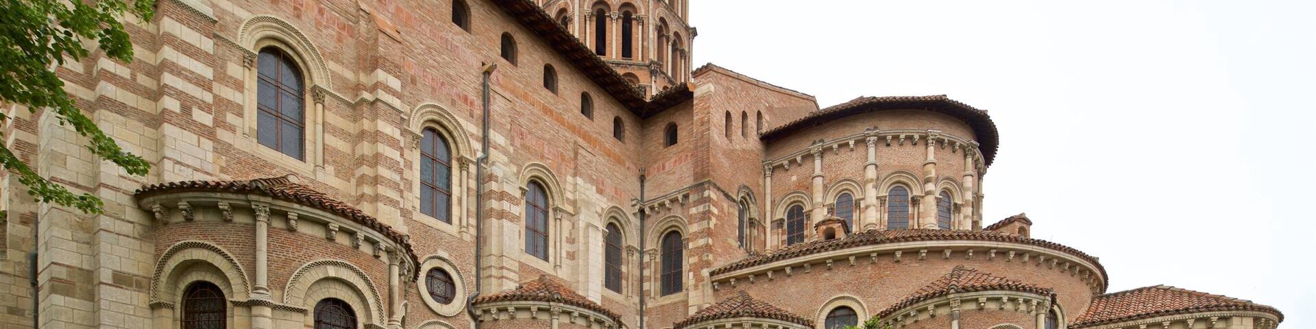 A historic church with arched windows and a bell tower.