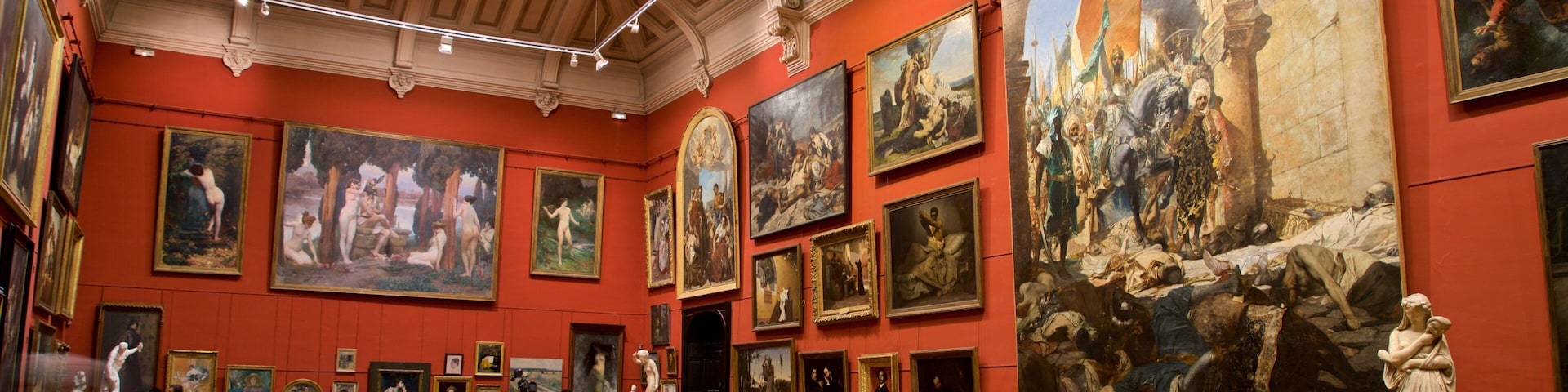 Museum of the Augustins showing interior views and art as well as a small group of people