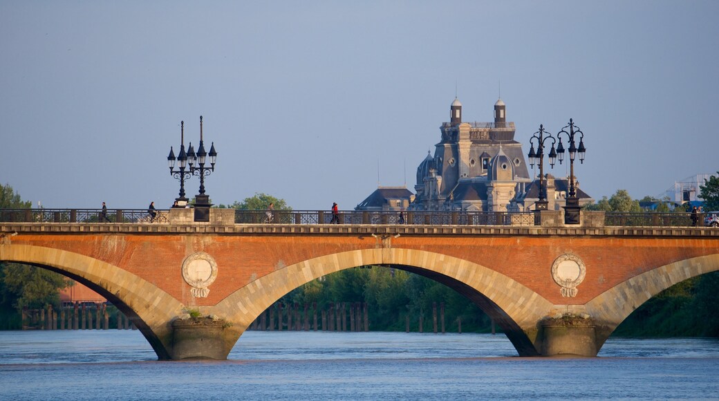 Pont de Pierre featuring a bridge and a river or creek