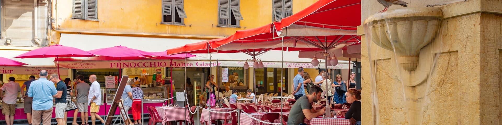 Place Rossetti which includes a fountain and outdoor eating as well as a small group of people
