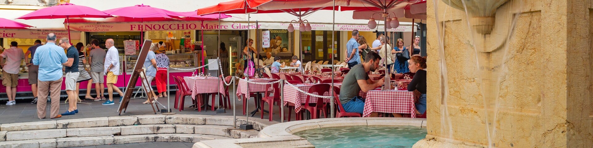 Place Rossetti which includes a fountain and outdoor eating as well as a small group of people