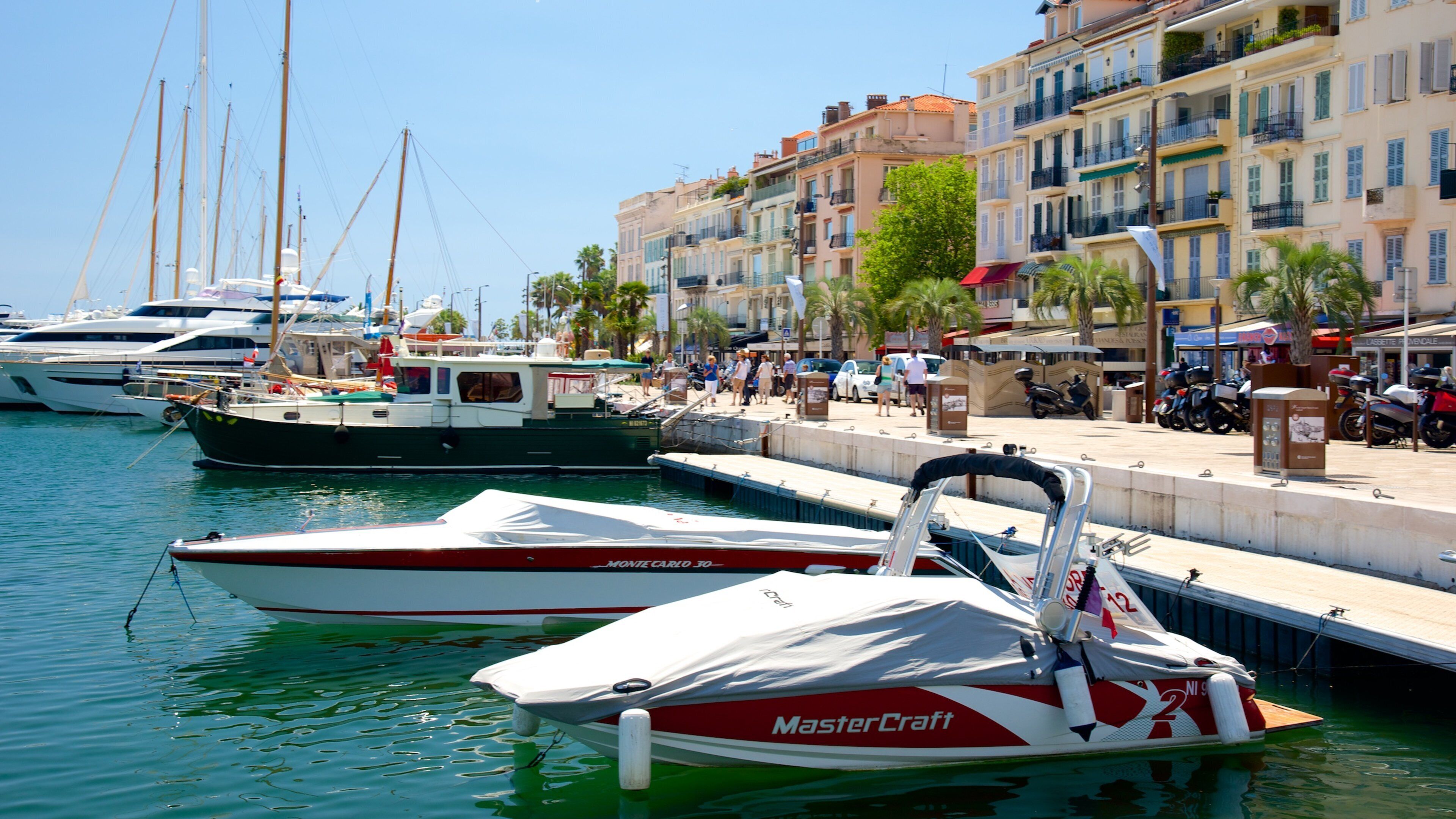 Cannes Harbour which includes a bay or harbor and a marina