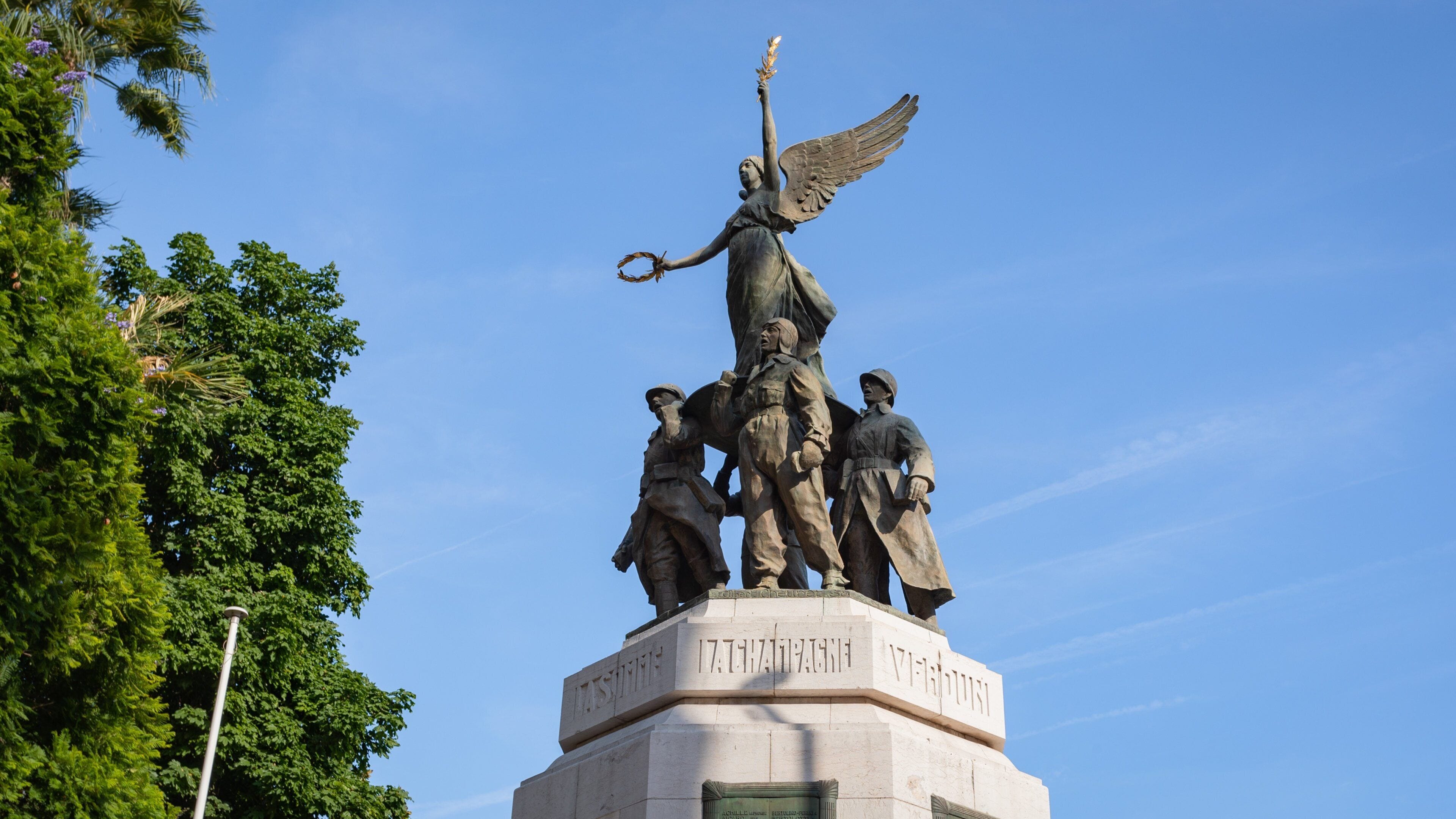 Cannes City Hall featuring a statue or sculpture
