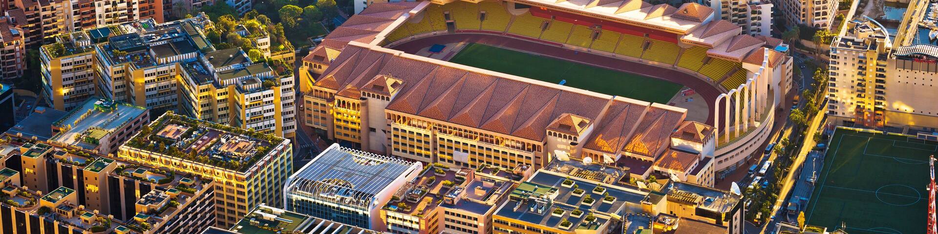 Fontvieille colorful waterfront and AS Monaco stadium aerial view