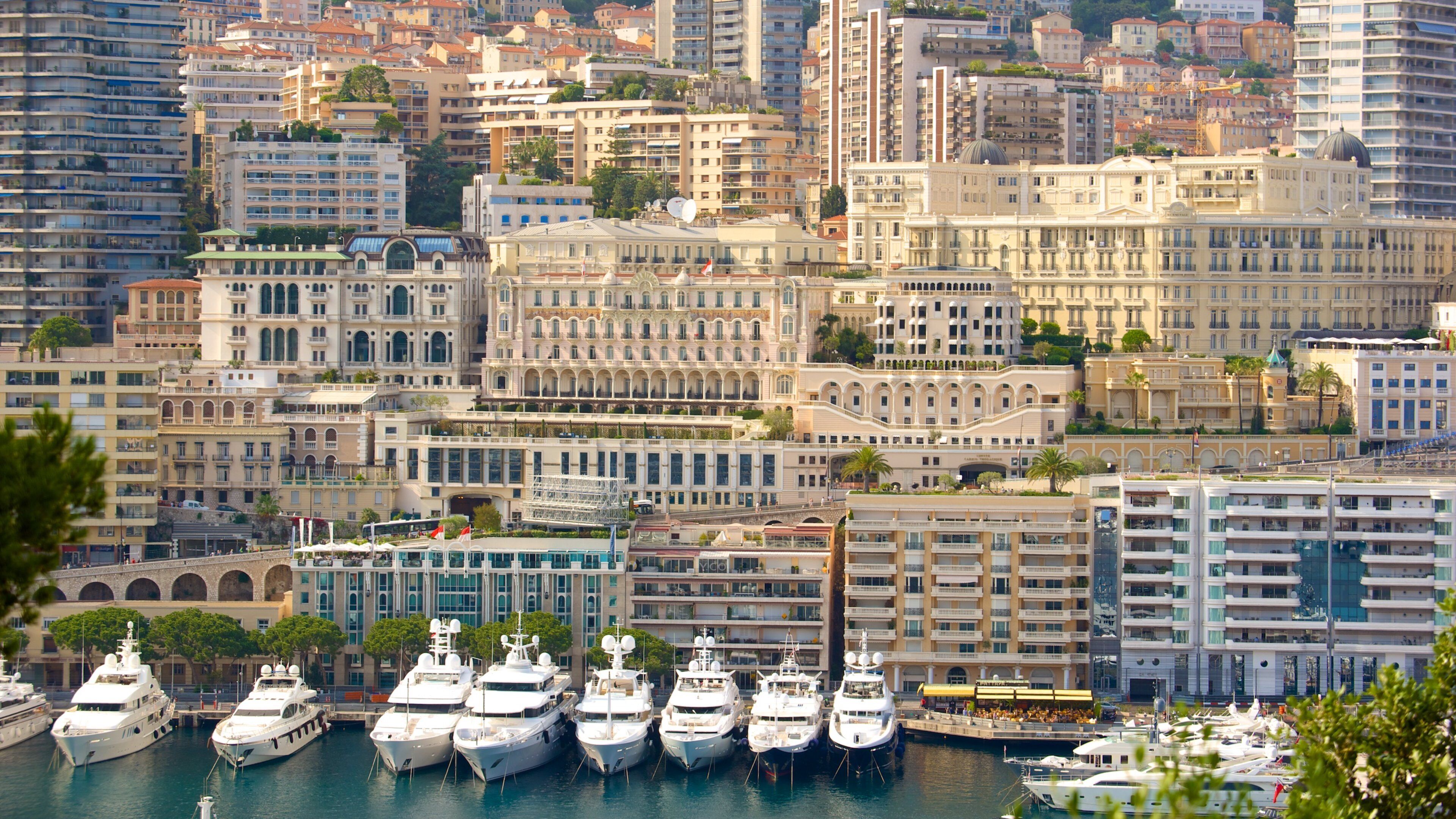 Monaco Harbour which includes a coastal town and a bay or harbor