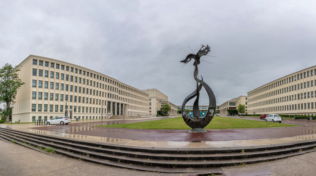 Caen, France - 07 27 2023: View of the campus University of Caen Normandy, the buildings building and the sculpture the phoenix from Esplanade of Peace.