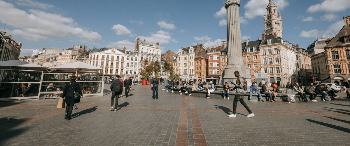Lille Grand Square which includes a square or plaza, street scenes and a statue or sculpture