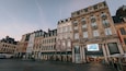 Lille Grand Square showing a city, a sunset and heritage architecture