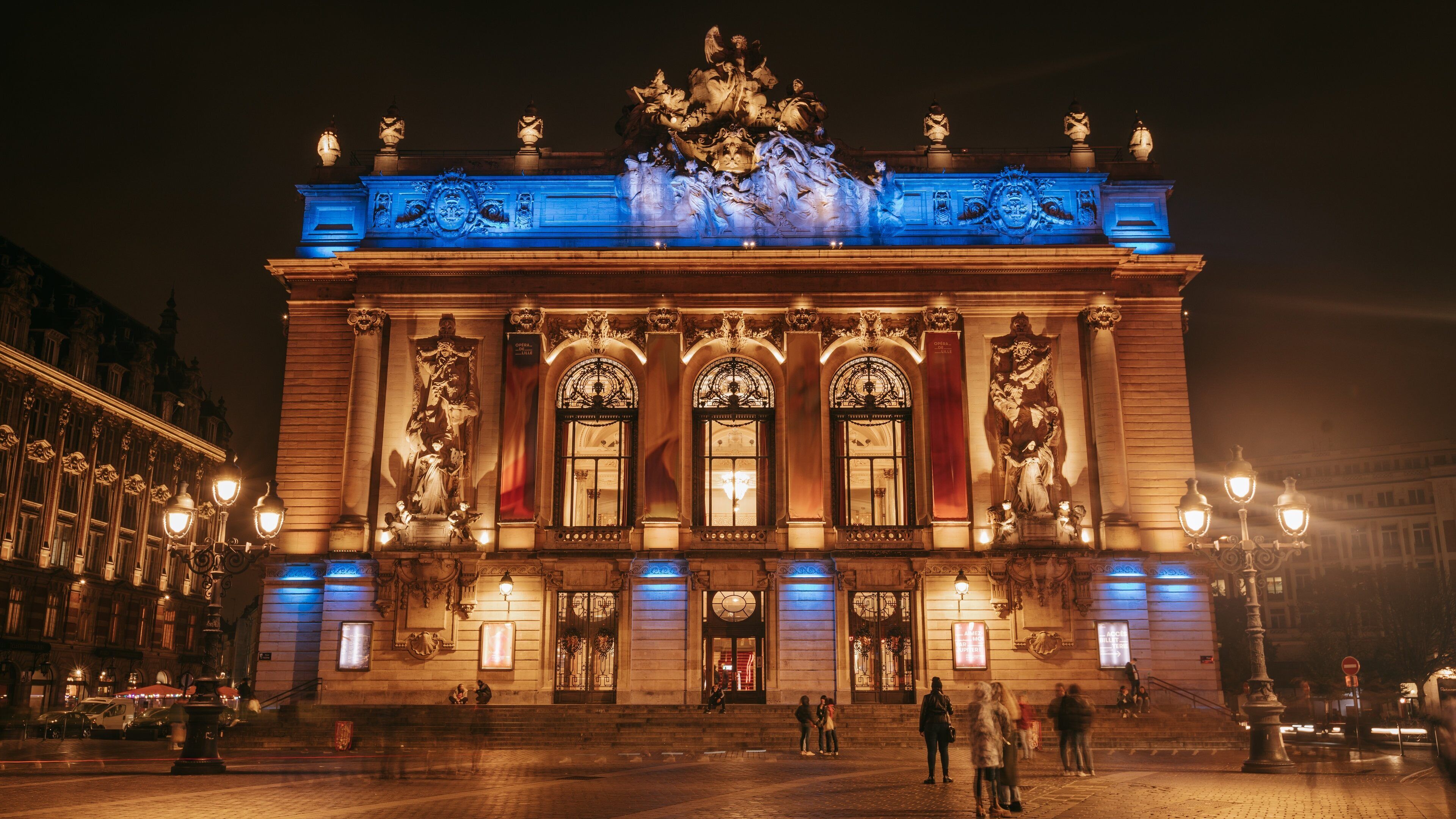 Opera House which includes night scenes and heritage architecture