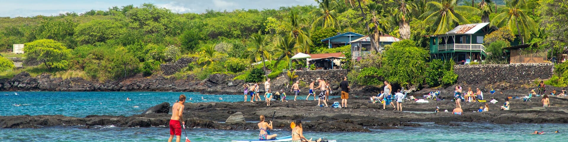 Pu\'uhonua o Honaunau National Historical Park featuring general coastal views, kayaking or canoeing and tropical scenes
