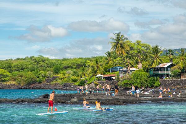Pu\'uhonua o Honaunau National Historical Park featuring general coastal views, kayaking or canoeing and tropical scenes