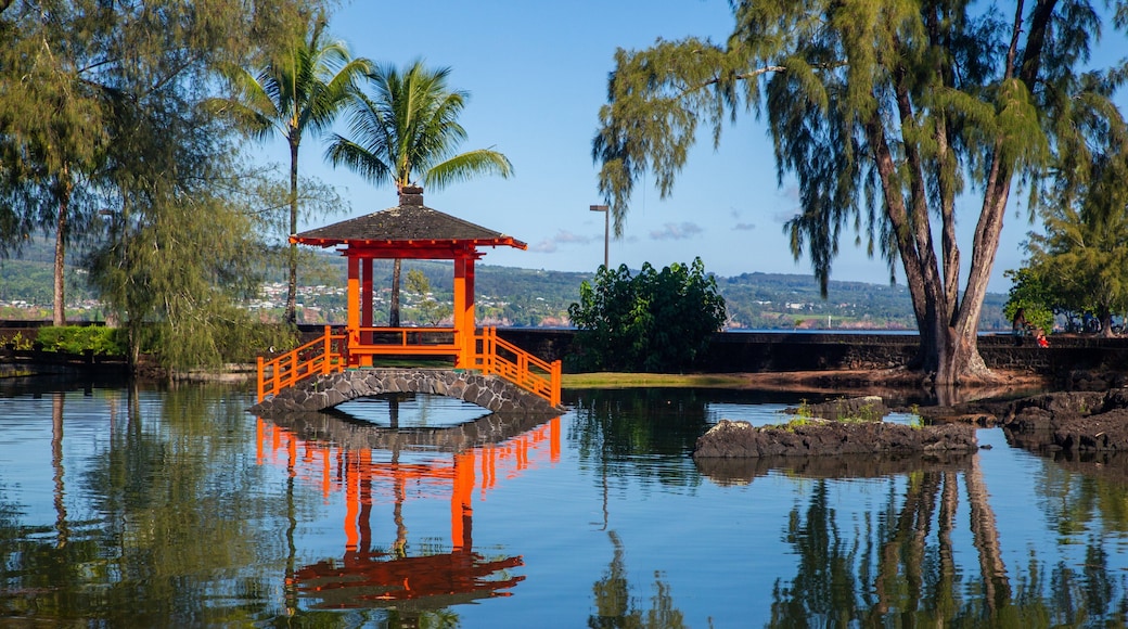 Liliuokalani Park and Gardens featuring a pond