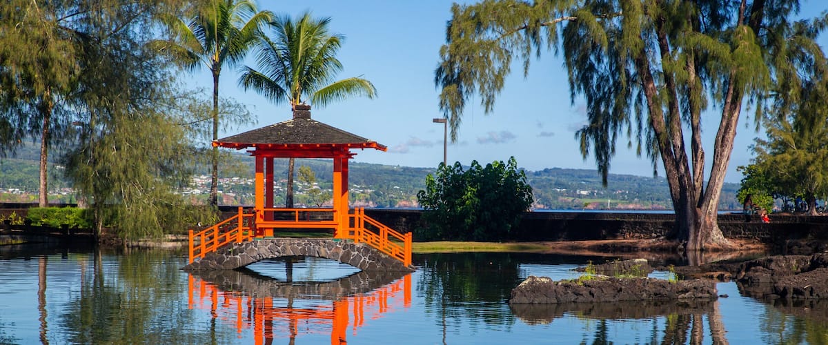 Liliuokalani Park and Gardens featuring a pond