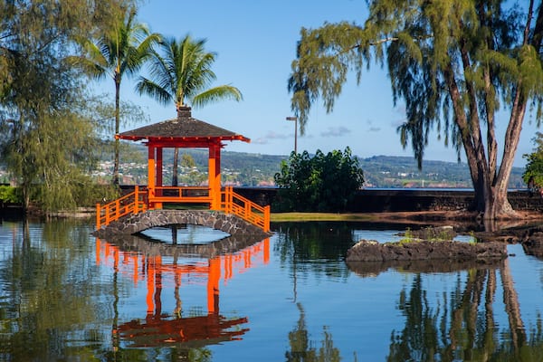 Liliuokalani Park and Gardens featuring a pond