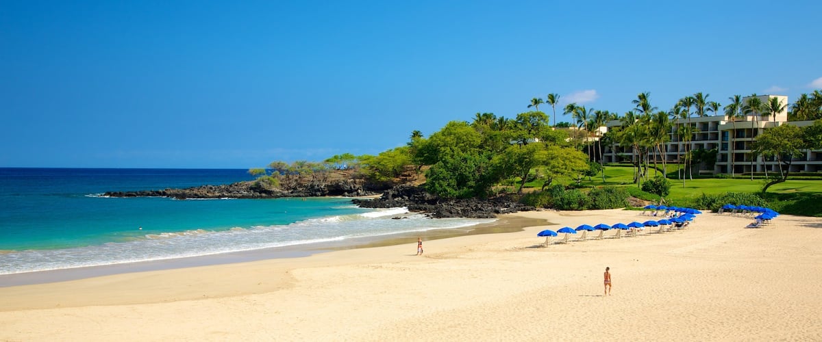 Hapuna Beach State Park which includes a coastal town, a beach and a luxury hotel or resort