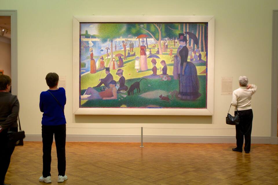 A large painting of a park scene with people and a dog.