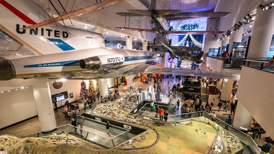 A United Airlines Boeing 727 jetliner suspended in an indoor museum.
