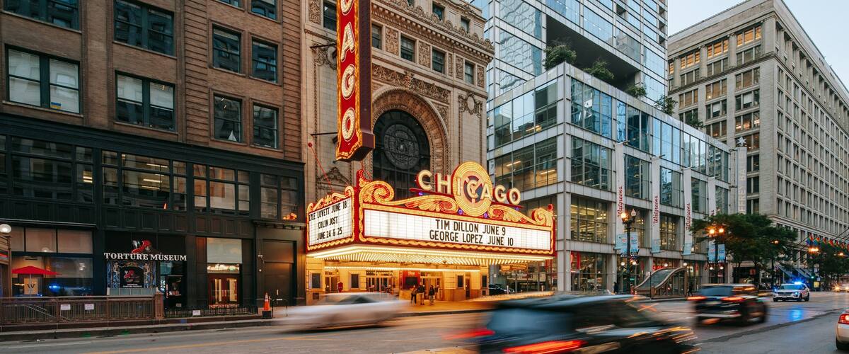 Chicago Theatre featuring a city, signage and street scenes