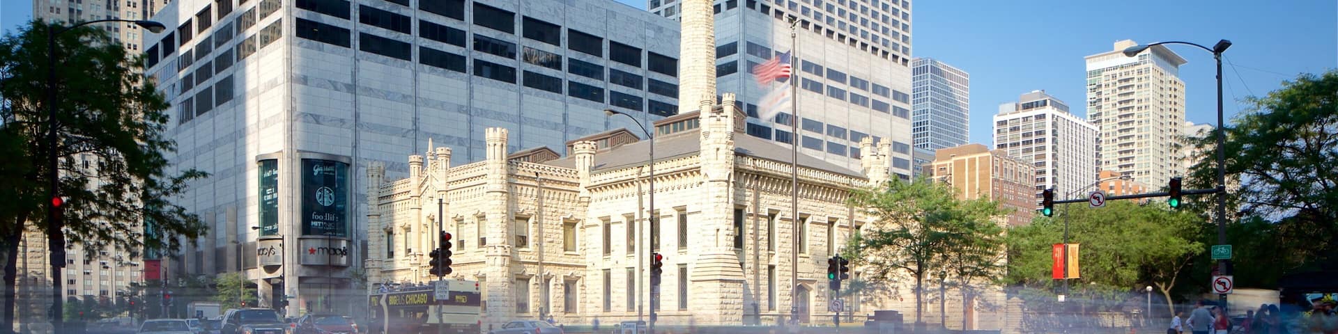 A city intersection with tall buildings, including a historic building labeled "Water Tower Place."