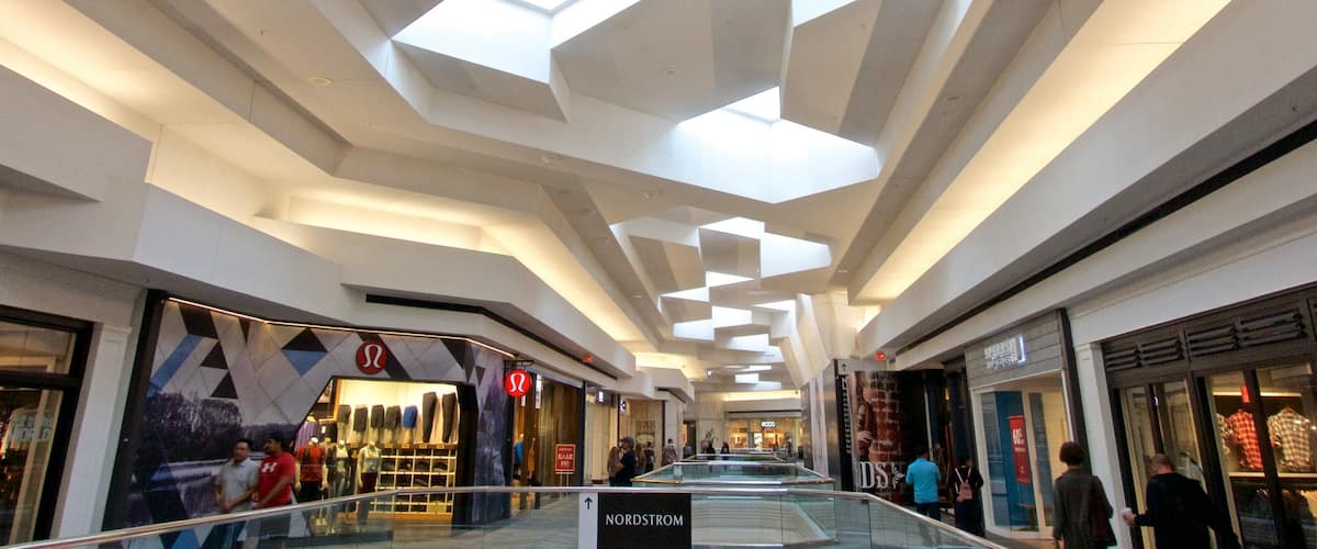 Woodfield Mall which includes shopping and interior views