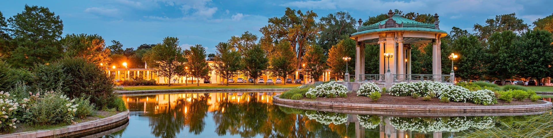 The Muny Theater showing a pond and a garden