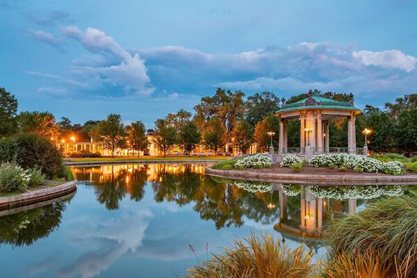 The Muny Theater showing a pond and a garden