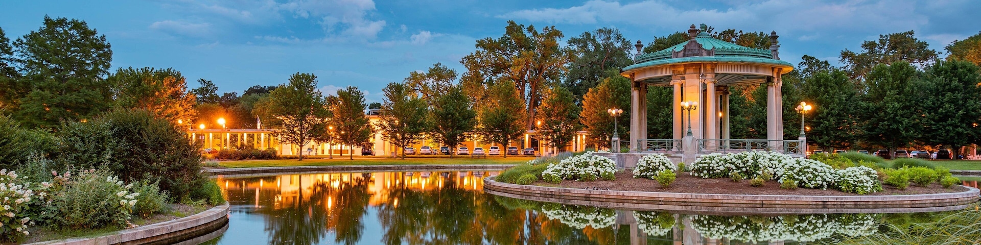 The Muny Theater showing a pond and a garden