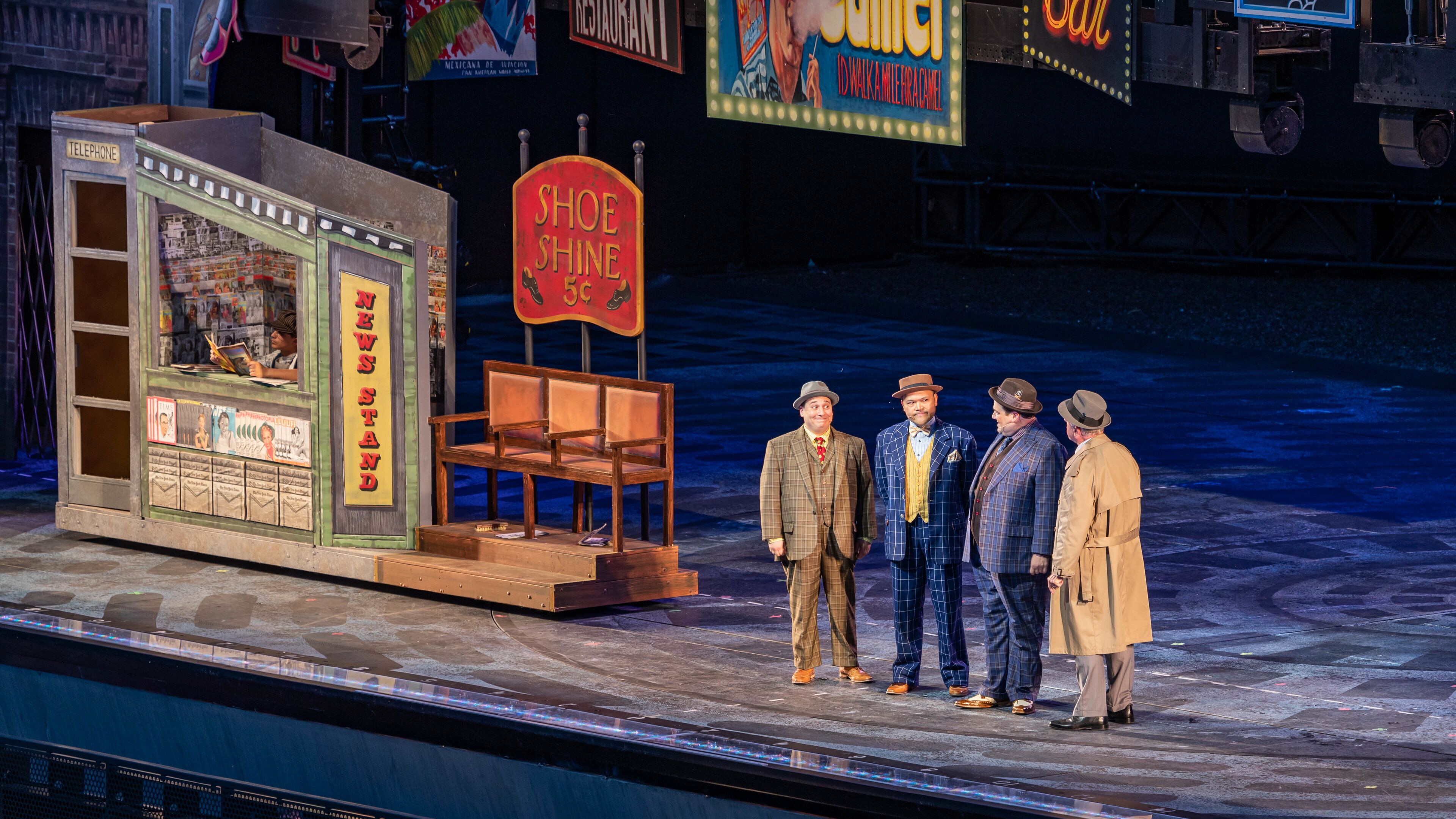 The Muny Theater featuring performance art and theater scenes as well as a small group of people