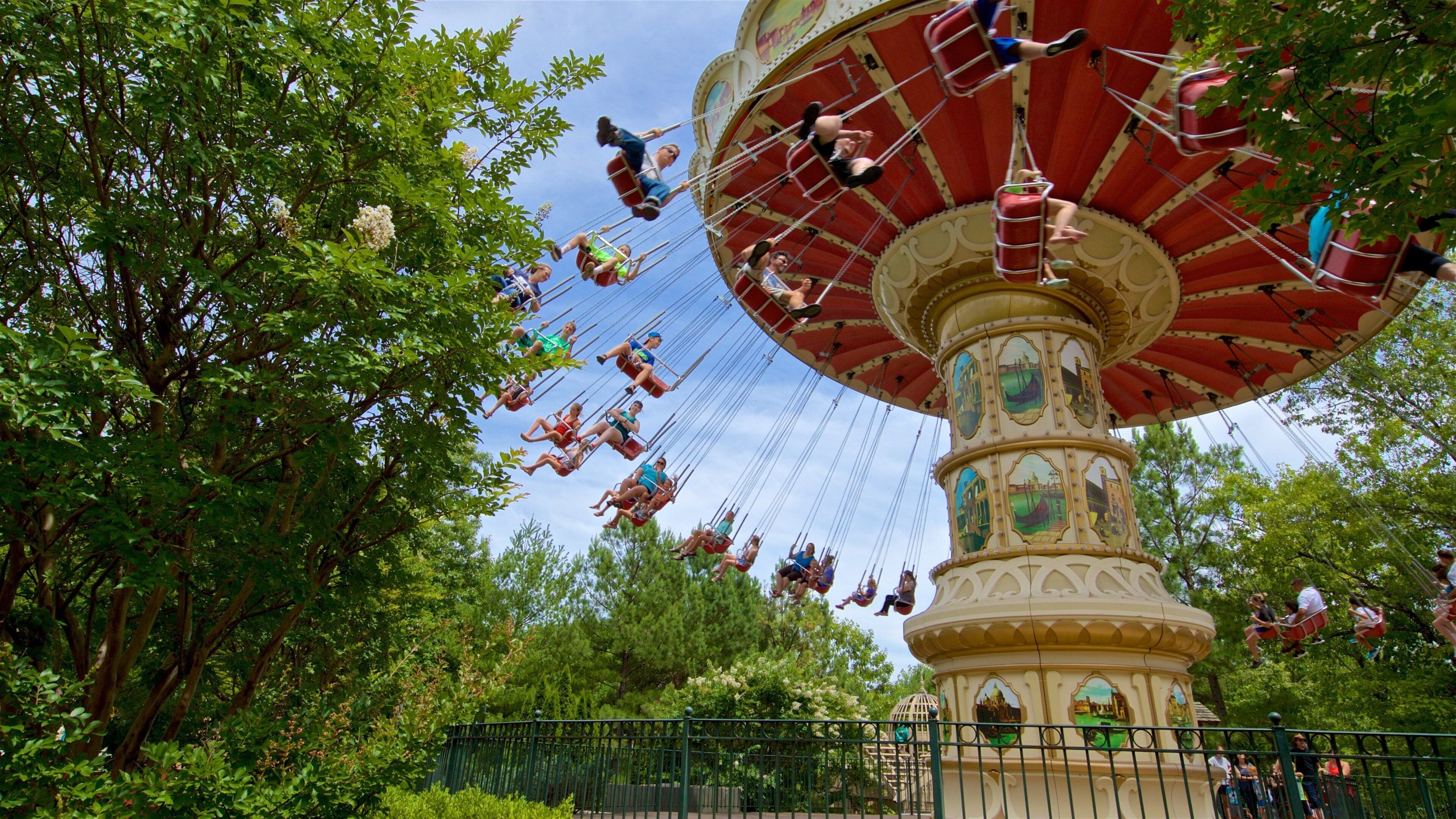 Silver Dollar City showing rides as well as children