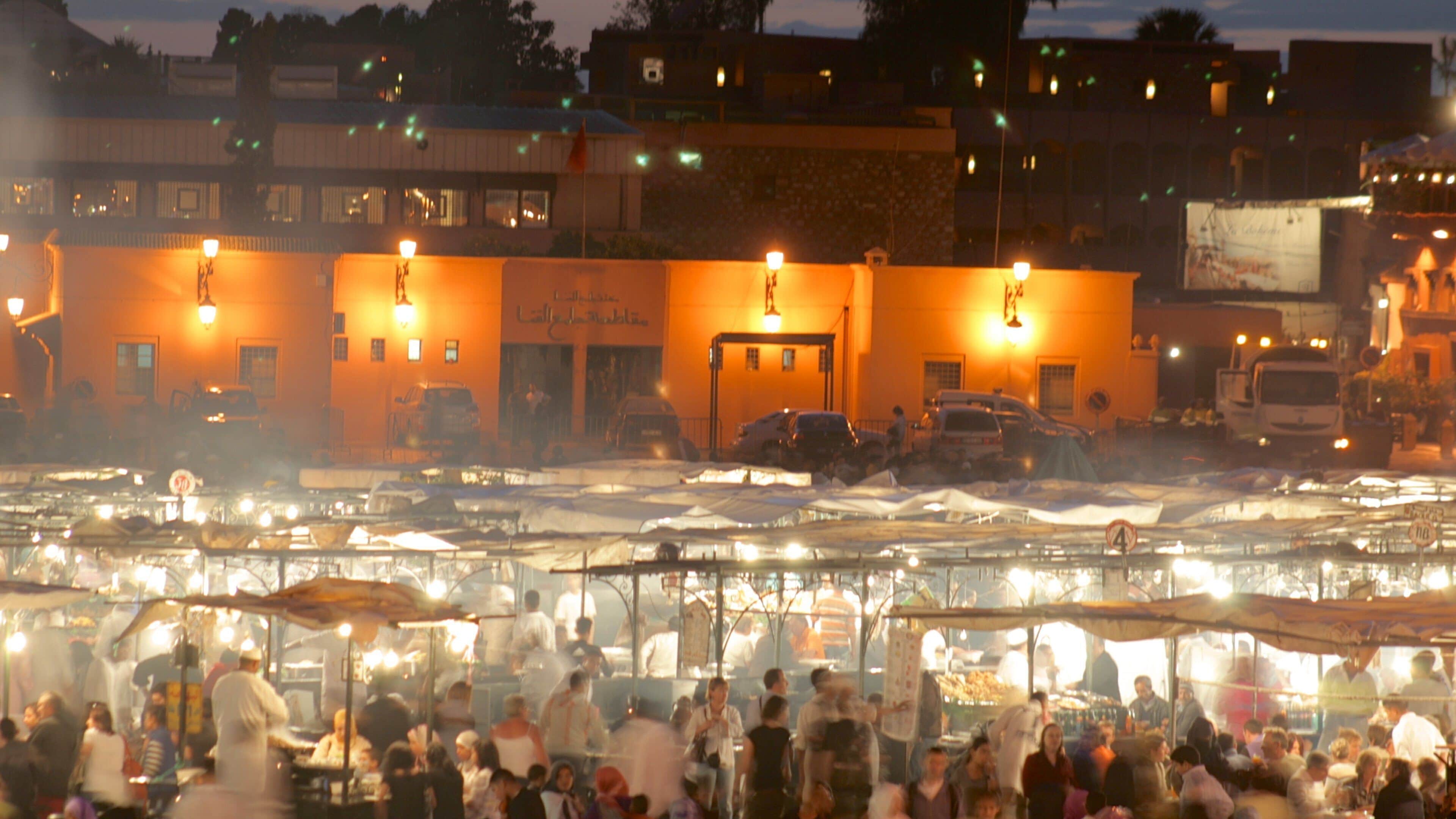 Jemaa el-Fnaa showing markets and night scenes as well as a large group of people