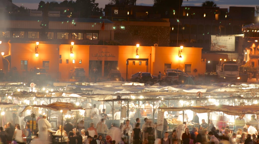 Jemaa el-Fnaa showing markets and night scenes as well as a large group of people