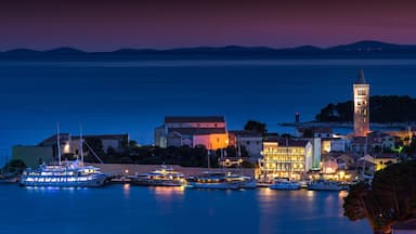 the port of novalja in croatia photographed at night in the form of a long exposure with lights taken in summer