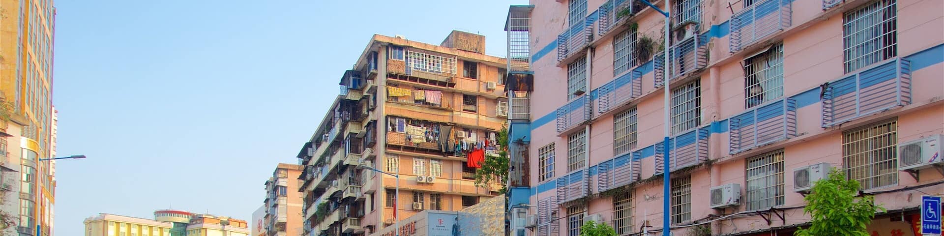 Tianhe showing a city as well as a small group of people