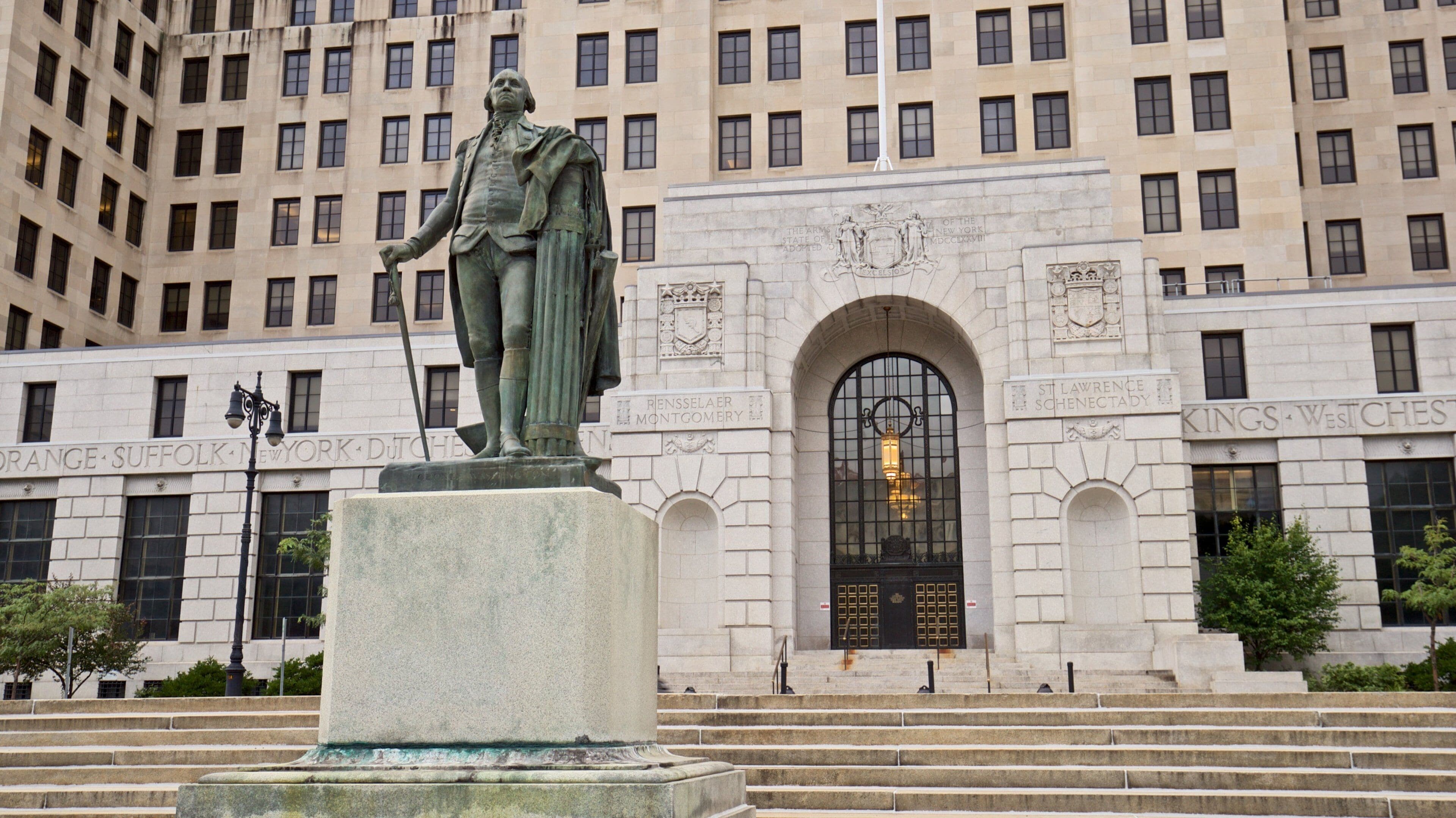 Alfred E. Smith State Office Building showing a statue or sculpture and modern architecture
