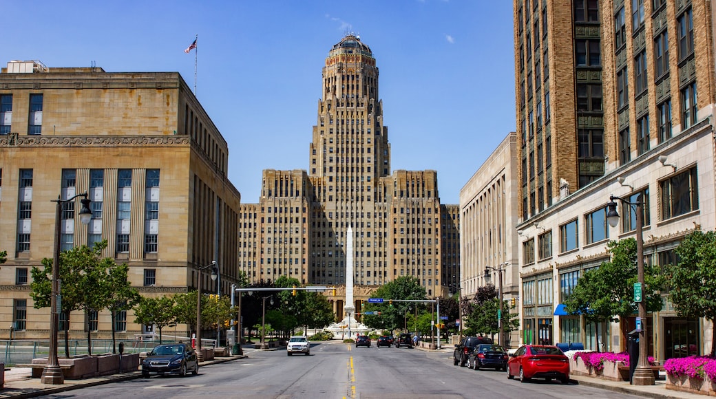 Buffalo City hall and Niagara Square ( State of New York) view from court Street during day time from the middle of the road. Blue sky with almost no clouds and no cars driving by.