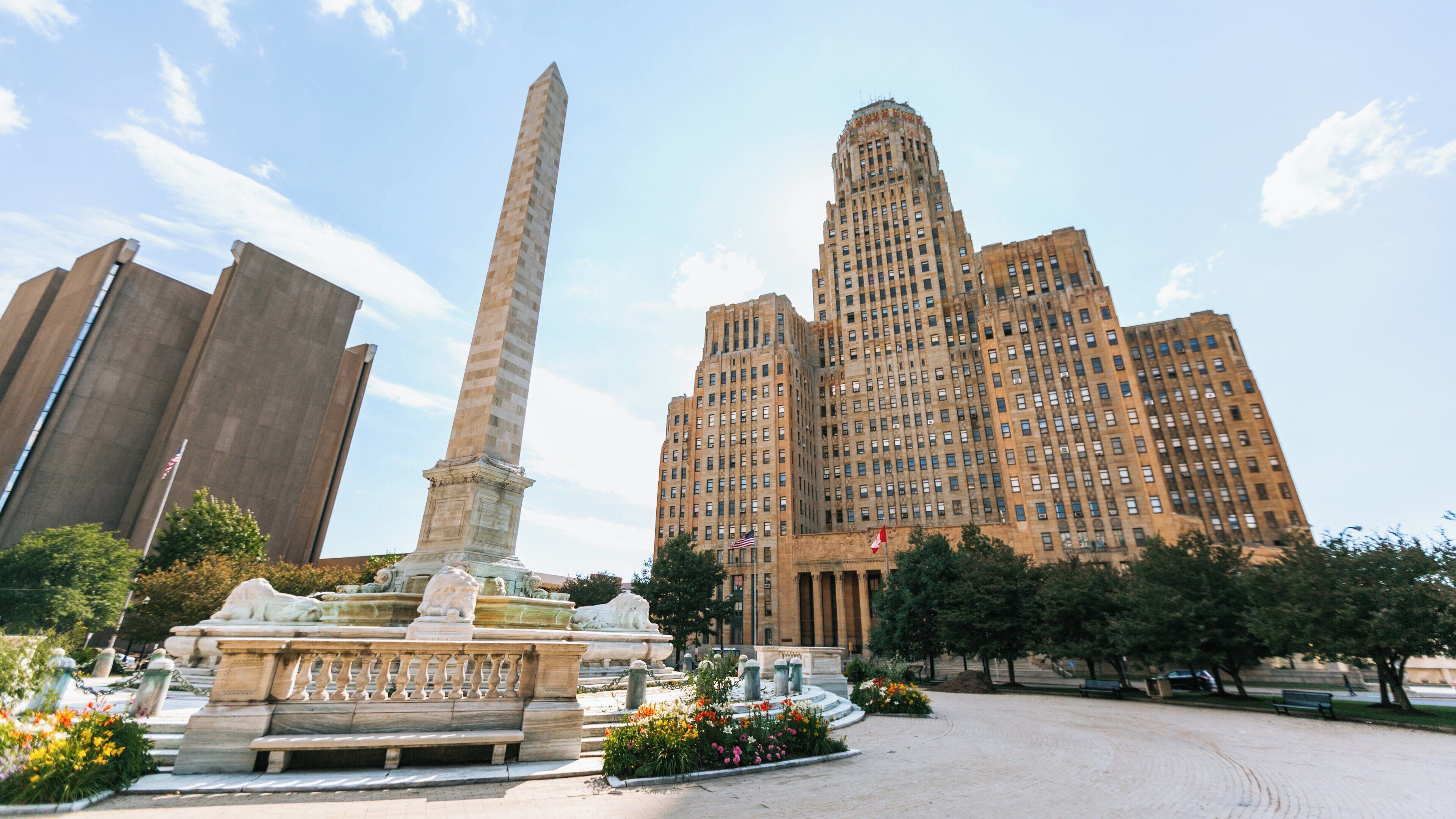 Buffalo City Hall stands proudly in Downtown Buffalo, New York, showcasing its Art Deco architecture and surrounded by vibrant gardens and historical monuments