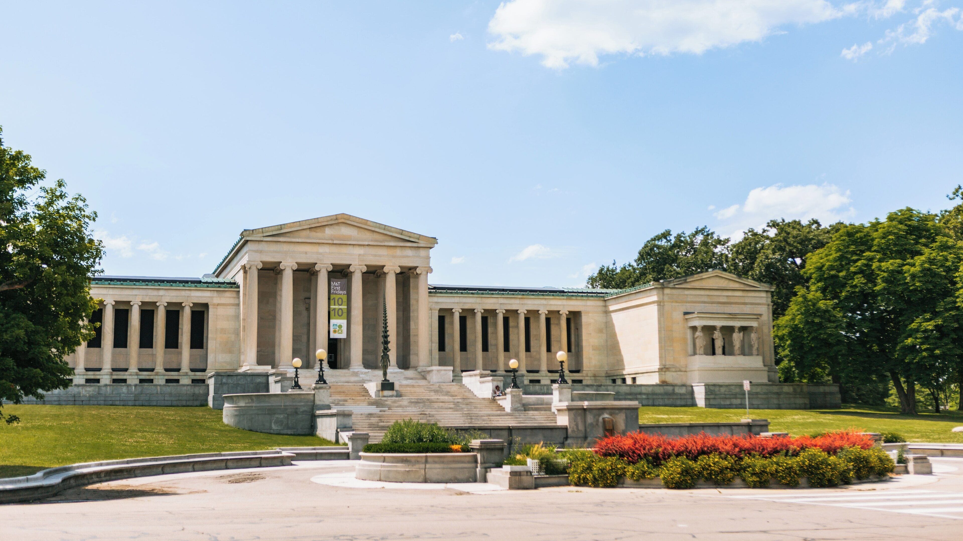Explore Delaware Park in North Buffalo showcasing its historic architecture and beautifully landscaped gardens on a sunny day in Buffalo, New York