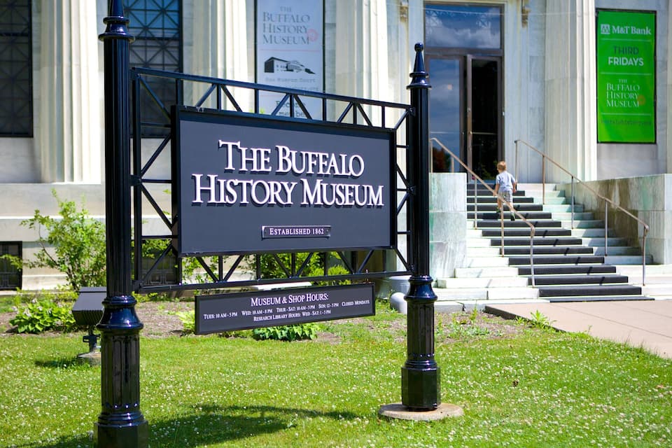 A sign for The Buffalo History Museum with a staircase leading up to the entrance.