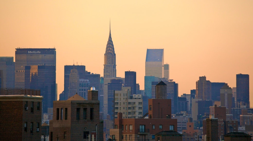 Chrysler Building featuring a city, a sunset and landscape views