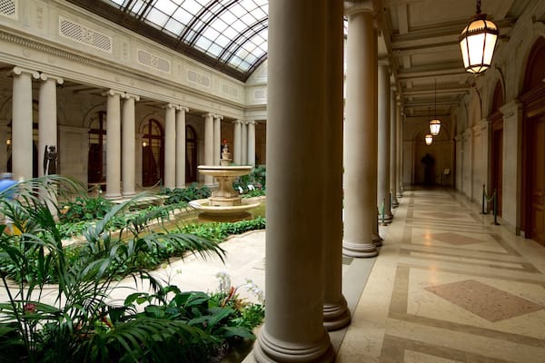 Frick Collection featuring a fountain, interior views and heritage elements