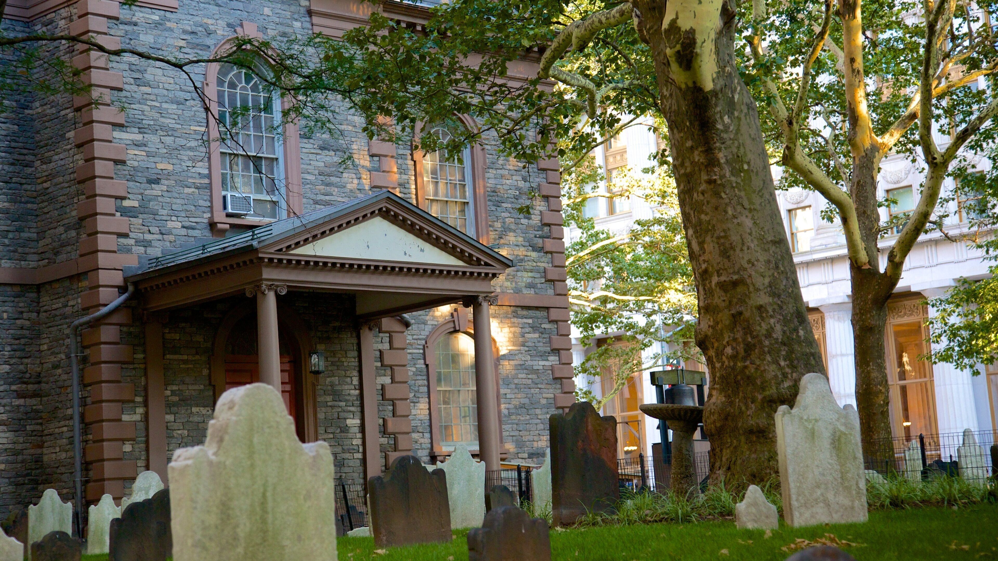 Trinity Church featuring a church or cathedral and a cemetery
