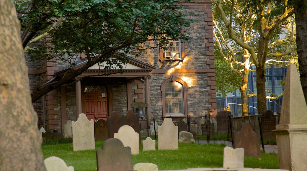 Trinity Church featuring a cemetery and a church or cathedral