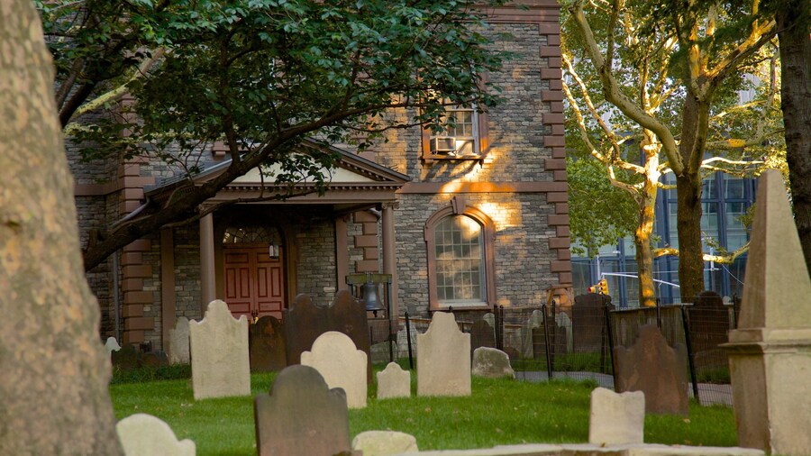 Trinity Church featuring a cemetery and a church or cathedral