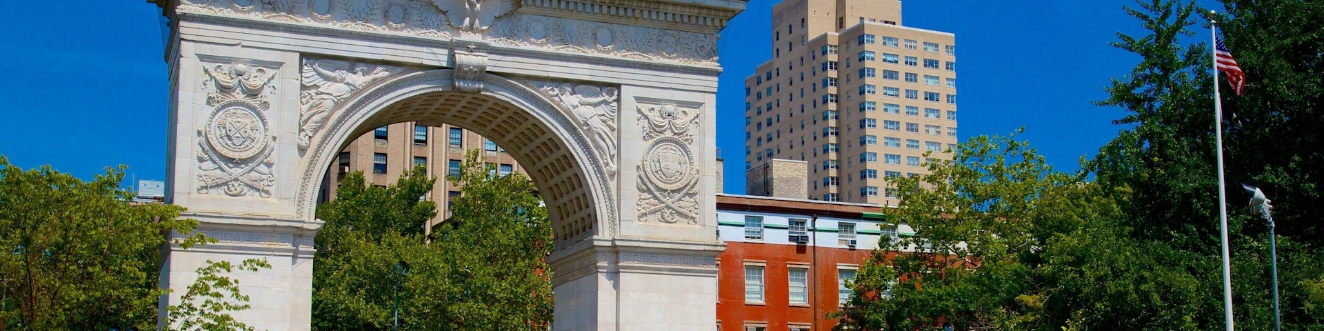 Washington Square Park featuring a park as well as a large group of people