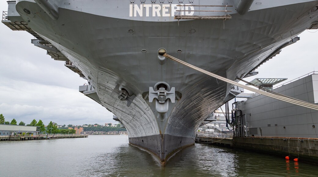Intrepid Sea, Air and Space Museum featuring a marina, military items and signage